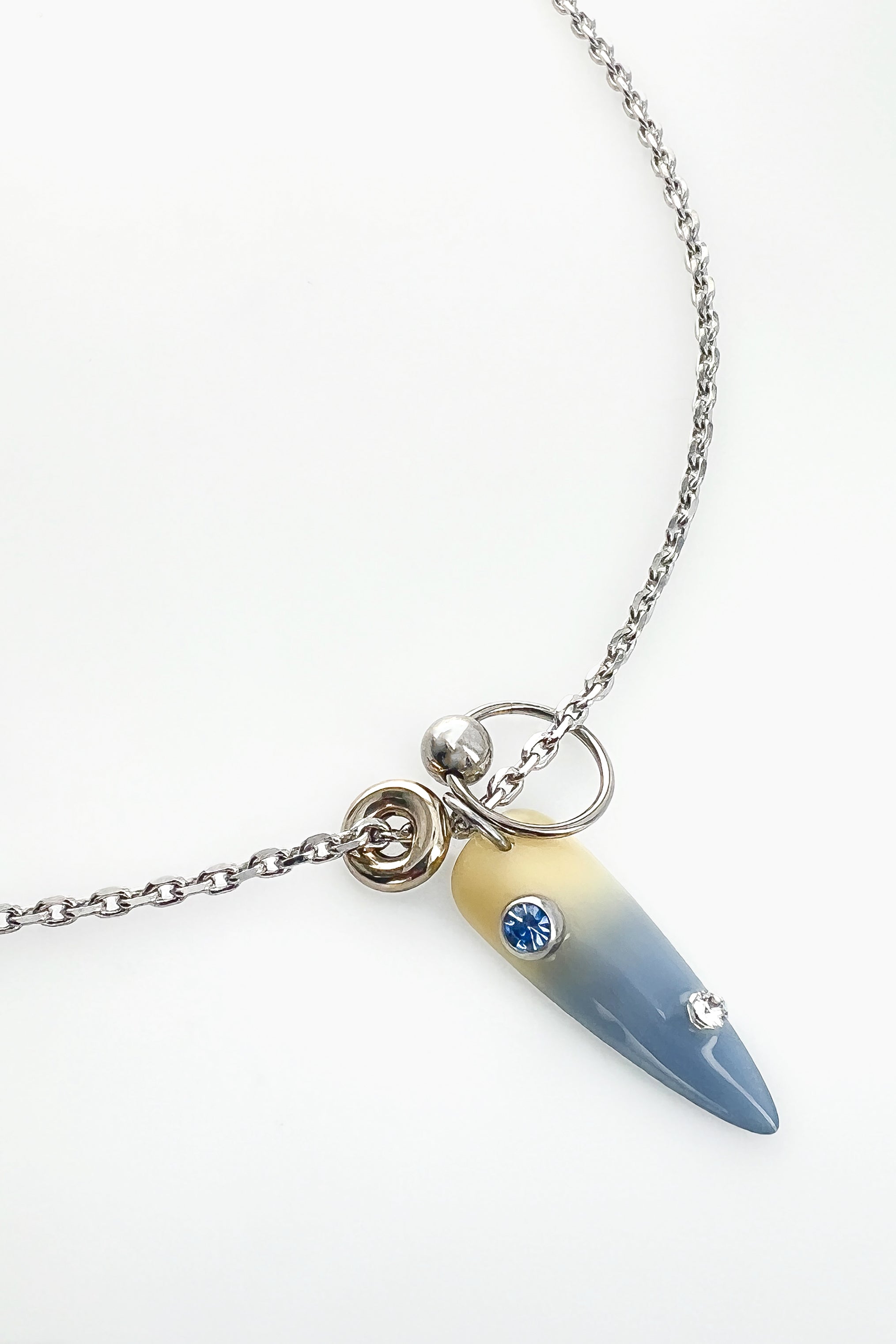 Nail blue necklace